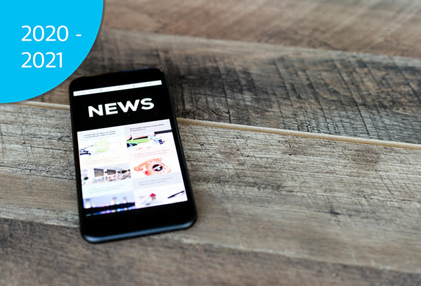 photo: cell phone with news displayed on screen (iStockphoto)