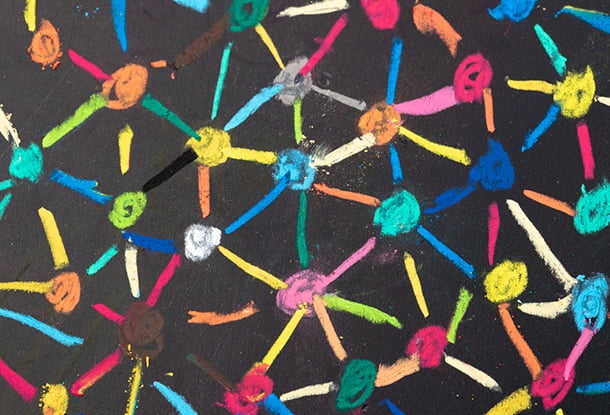 Colourful dots and lines connecting together on a chalkboard (iStockphoto)