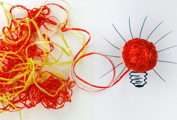 Intertwined strings make lightbulb (iStockphoto)