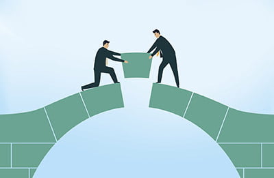 Setting bridge keystone together (iStockphoto)