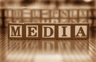 Media spelled out on blocks