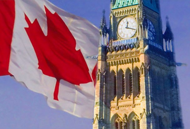 Canadian flag and Parliament buildings (iStockphoto)