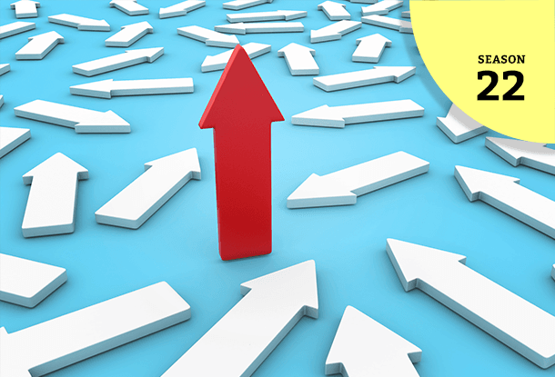 One red arrow emerges from an array of white ones (iStockphoto)