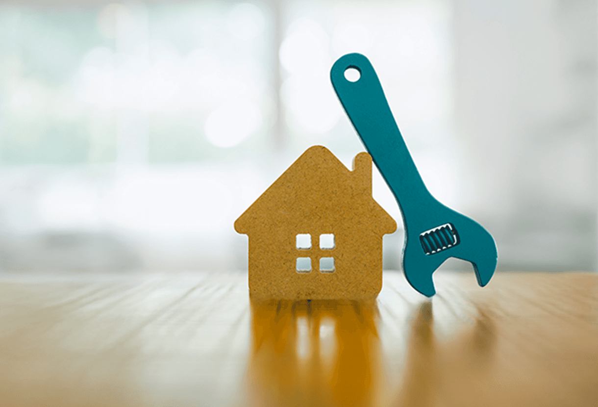 photo: small wrench leaning on the outline of a house (iStockphoto)